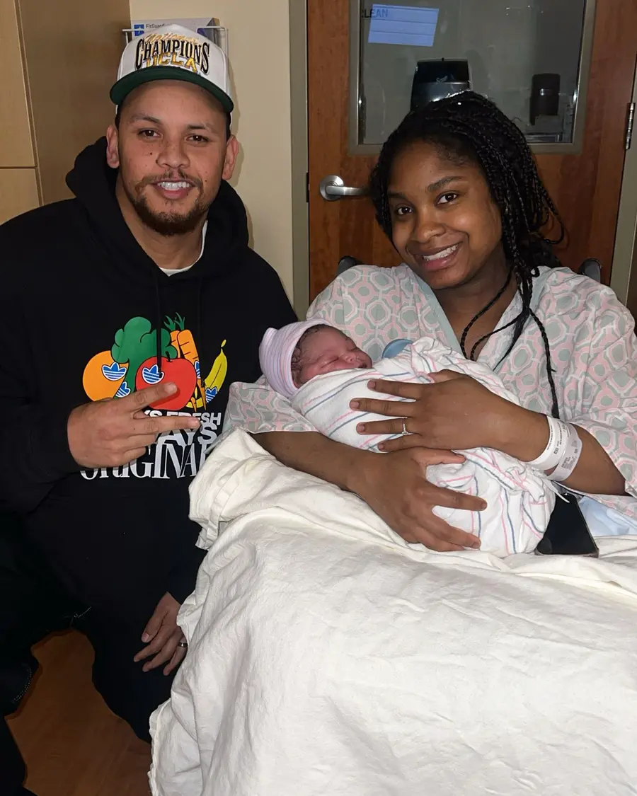 Coach Cal with his wife and newborn — Bay Area rapper, family-first